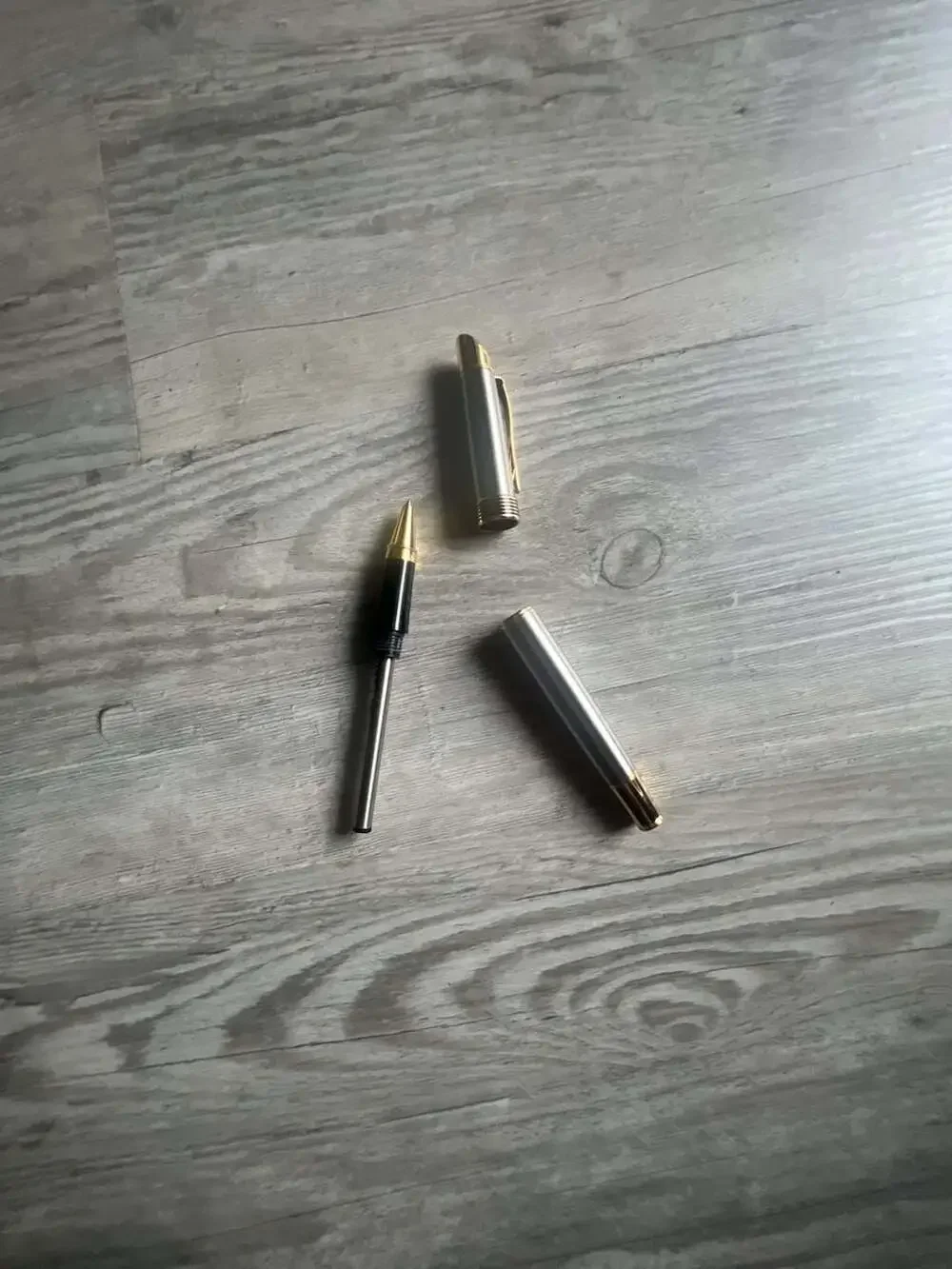 Parker IM Brushed Metal Gold Trim Rollerball Pen
